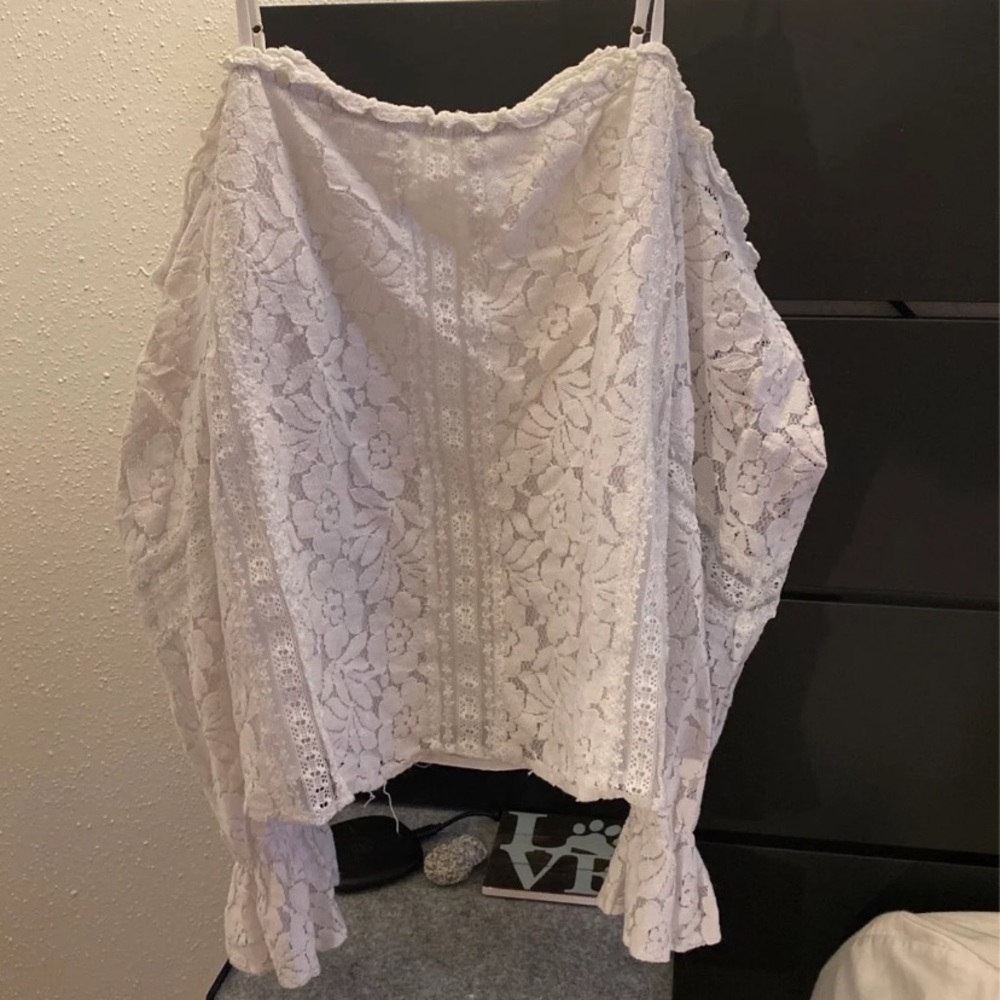 White shoulder strap blouse